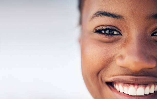 Closeup shot of a beautiful young woman standing outside I'm healthy and happy human mouth stock pictures, royalty-free photos & images