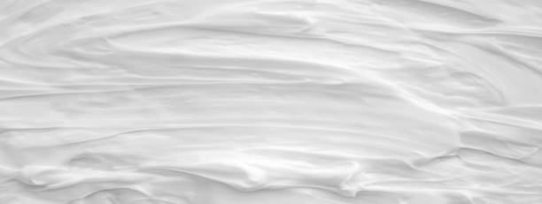 istock White surface of the cream lotion softens the background. 1366103301