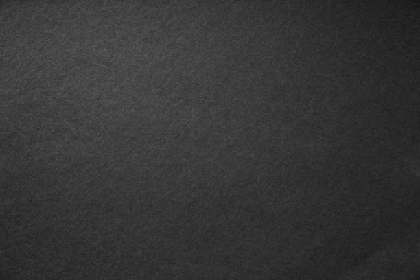 istock Smooth paper background with clean black abstract texture. 1366103836