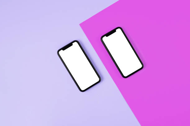 istock Mobile Phones on Two Toned Colored Background 1366104859
