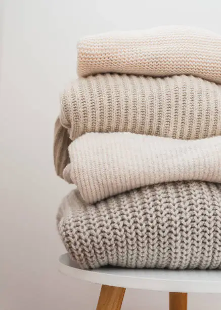 Photo of Folded cozy knitted sweaters
