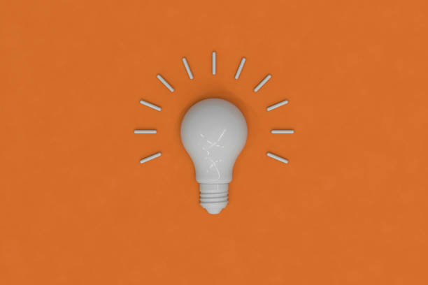 3D illustration of white classic light bulb on orange background. Idea concept.
