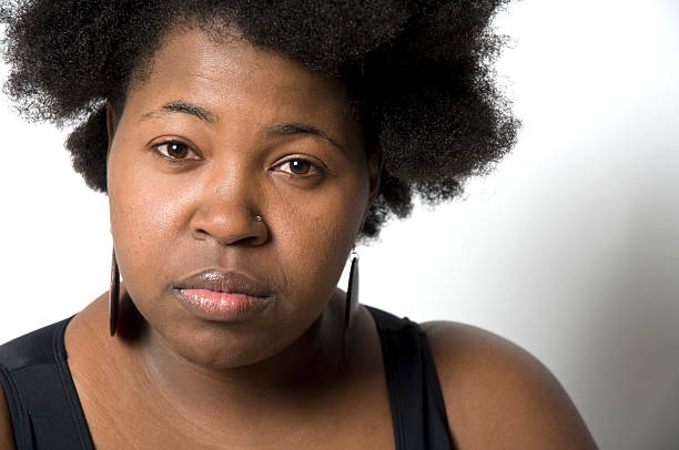 istock Serious Black Large Female Headshot With Emotion 136611149