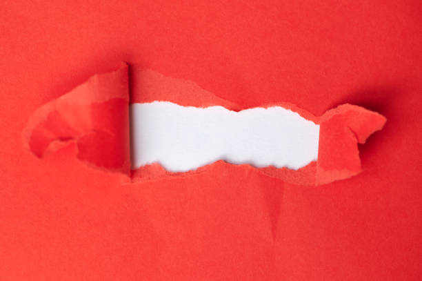 istock red torn paper with a white space for any text 1366111552