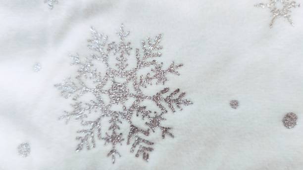 istock christmas background with stars and snowflakes 1366115436