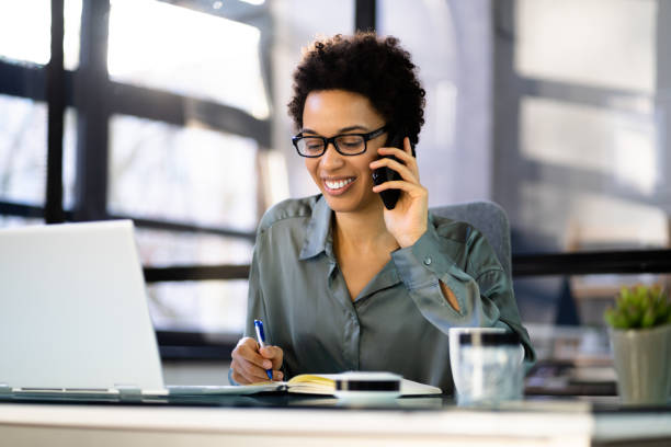 istock Business Woman Using Mobile Phone Technology 1366115853