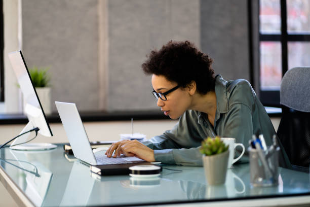istock African Woman Bad Posture Working Typing 1366115883