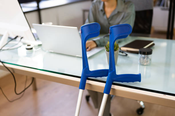 istock Young Injured Employee At Workplace 1366115947