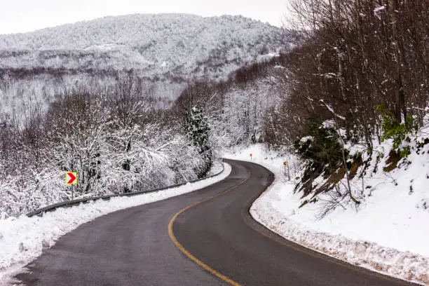 KARTEPE, KOCAELI, TURKEY. Beautiful winter landscape. Winter snowy forest with road.