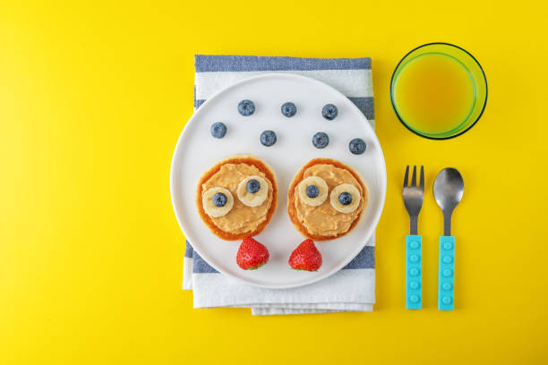 istock Kid's healthy breakfasts with funny faces 1366119195