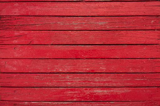 Red painted wooden board texture and background