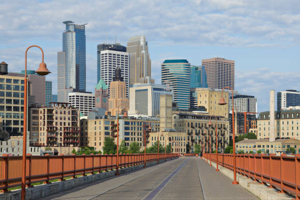 istock Minneapolis Skyline + Stone Arch Bridge 1366125056