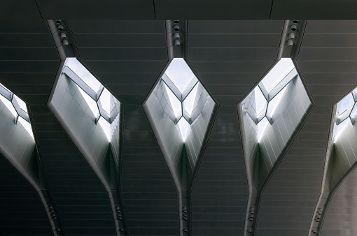 Closeup modern ceiling inside of office building, abstract background with copy space, full frames horizontal composition