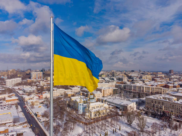 Ukrainian flag in the wind. Blue Yellow flag in the city of Kharkov Ukrainian flag in the wind. Blue Yellow flag in the city of Kharkov. ukraine flag stock pictures, royalty-free photos & images