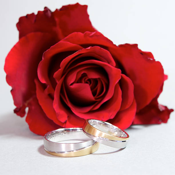 istock Wedding Rings with red rose 136612674