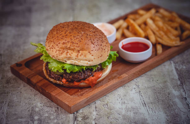 istock Hamburger and french fries 1366127830