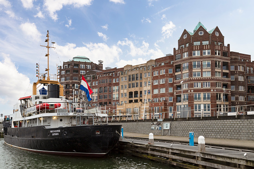 City canal street with canal houses in Amsterdam, Netherlands