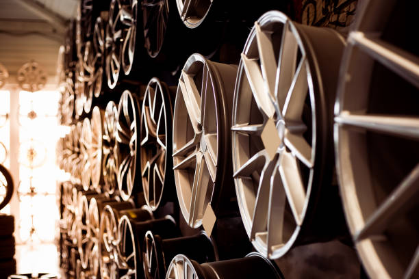 Fancy rims on a big rack in a specialist store.