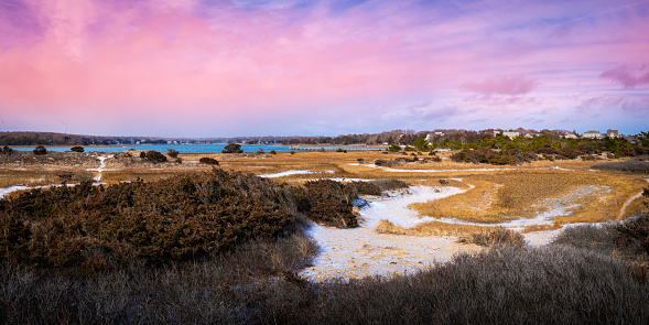 Winter winter landscape over the marsh at low tide on Cape Cod, Massachusetts