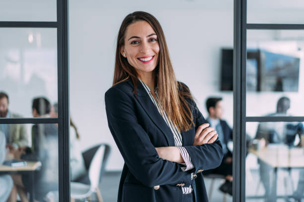 istock Successful businesswoman in the office. 1366137664