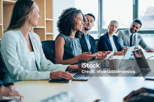 istock Business persons on meeting in the office. 1366137792