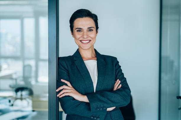 istock Confident businesswoman in modern office. 1366137851