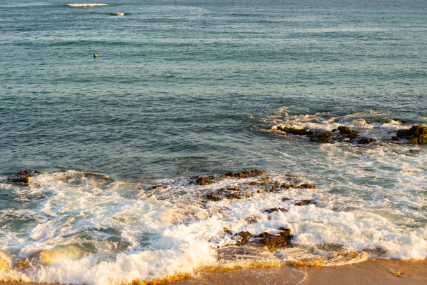 istock Ocean waves crashing on the beach. 1366139175