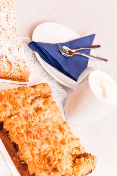 istock Crumble cake and cherry crumble cake 1366140315