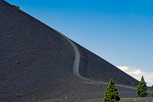 Cinder Cone, Tephra Volcanic Cone, Lassen National Park, California; Cascade Mountain Range. Made up of loose scoria and is the youngest mafic volcano in Lassen. Trail up the Cinder Cone.