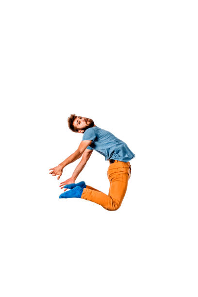 istock Caucasian young man dance, full length portrait isolated 1366153387