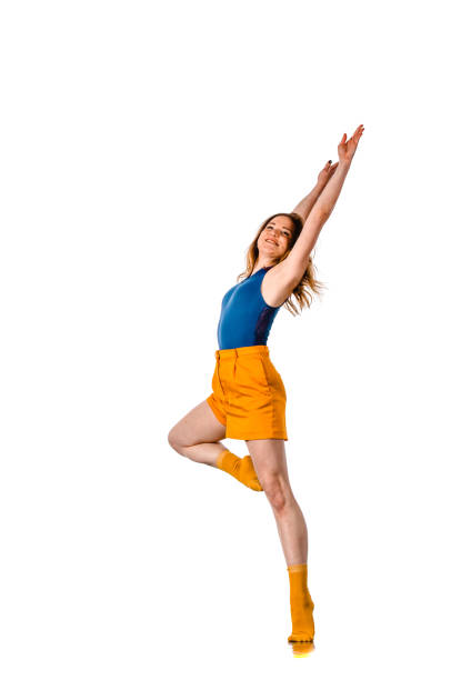 istock Girl perform dancing isolated on white background 1366153396