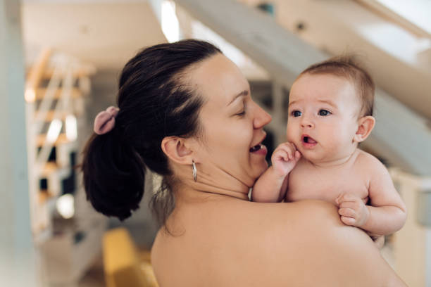 istock Mother with newborn baby 1366153836