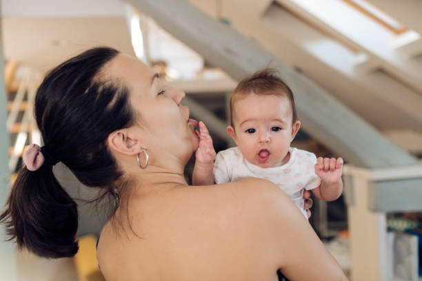 istock Mother with newborn baby 1366153841