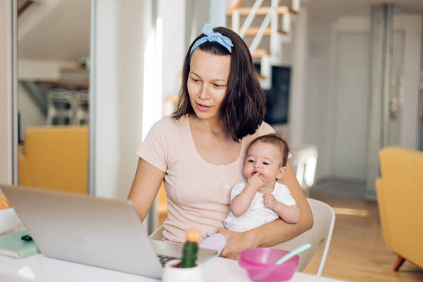 istock Mother with newborn baby 1366153864