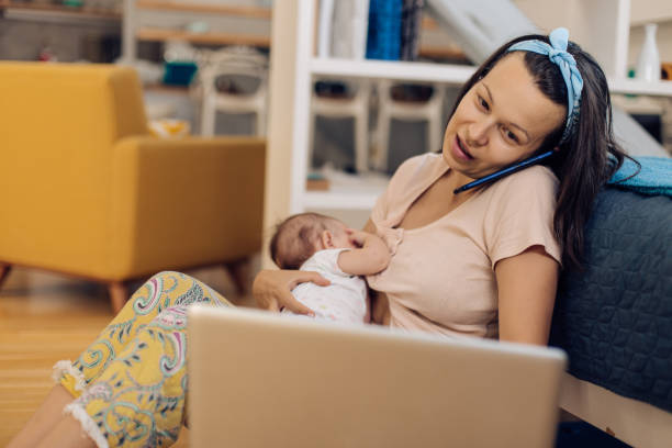 istock Young mother having fun with cute baby 1366153926