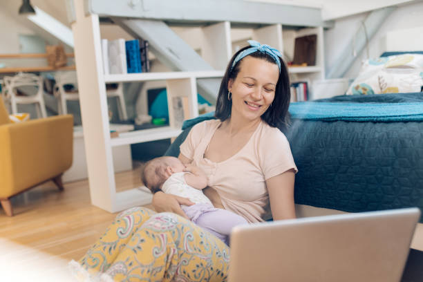 istock Young mother having fun with cute baby 1366153932
