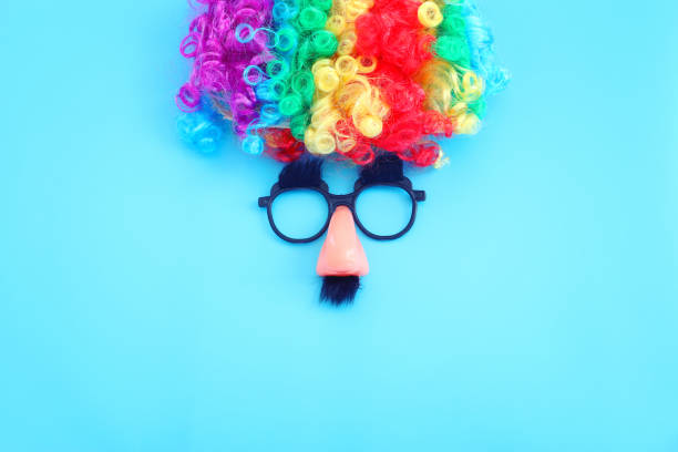 istock carnival, party and Purim celebration concept (jewish carnival holiday) over blue background 1366156665