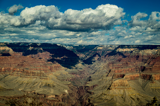 The Grand Canyon is located in northern Arizona, northwest of the city of Flagstaff. The canyon measures over 270 miles long, up to 18 miles wide and a mile deep, making it one of the biggest canyons in the world.