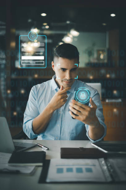 A businessman using face scan to cyber security for his saving account, business, technology and future Concept.