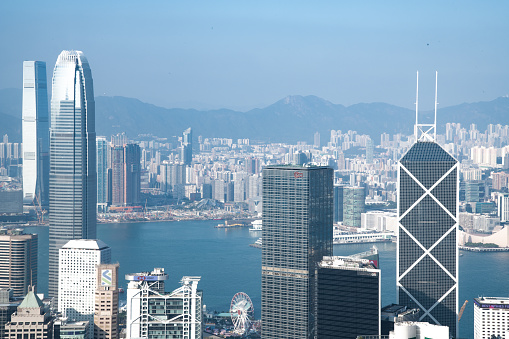 Aerial view of West Kowloon city skyline, Hong Kong. West Kowloon cityscape with skyscrapers and harbour.