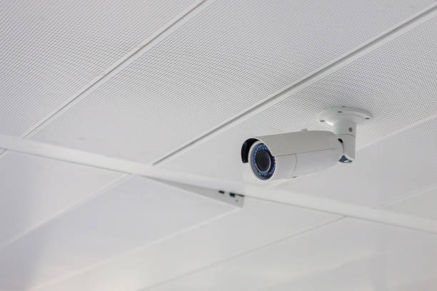 istock Modern Security Camera with office or house background, cctv to record and property protection for car park 1366184657