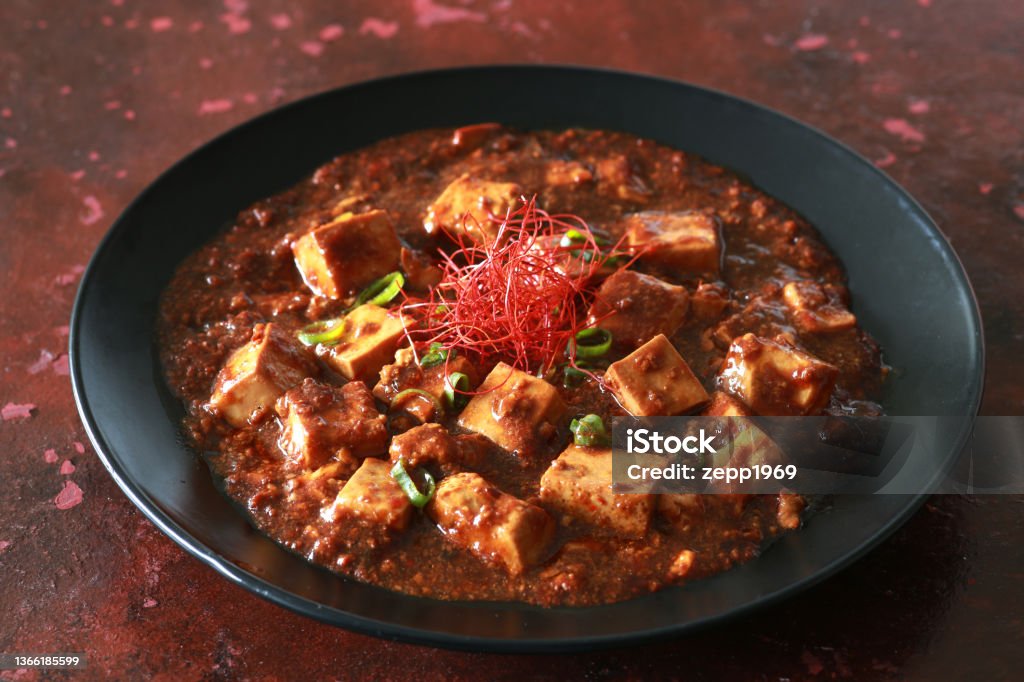 Mabo tofu Mapo tofu, Chinese food, Sichuan food, Mapo, tofu, spicy, tofu, chili pepper, spices, minced meat, red, spices Chinese Food Stock Photo