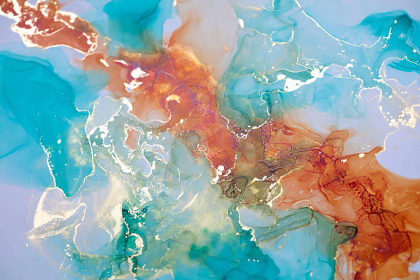 istock Alcohol ink abstract. Gold and emerald divorce. Ocean waves. 1366188275