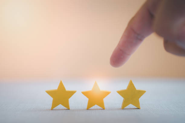 istock Man pointing yellow star shape in the center. 1366189010