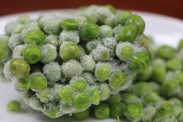 istock Frozen green peas, processed foods 1366189145