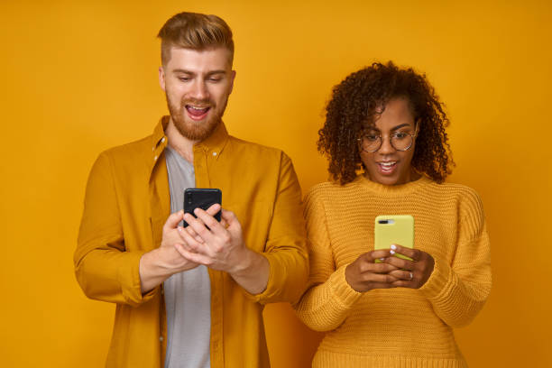 istock Two geeks use modern technologies for posting photos in social networks 1366194048