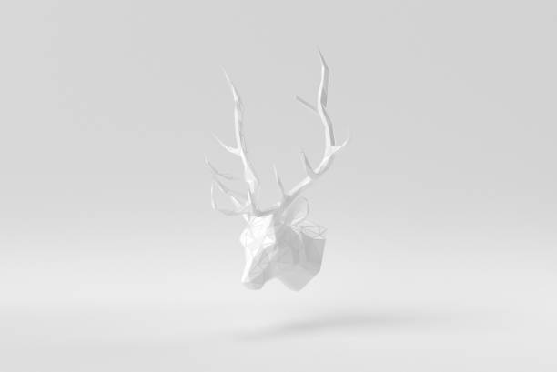 istock White deer head on a white background. Abstract polygonal minimal concept. monochrome. 3D render. 1366195036