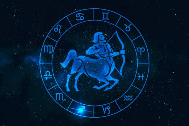 Photo of sagittarius horoscope sign in twelve zodiac with galaxy stars backgroun