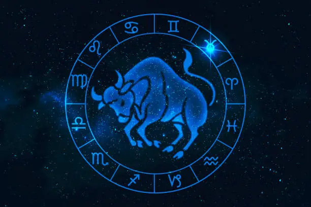 Tauruss horoscope sign in twelve zodiac with galaxy stars background, graphic of polygon man thinking