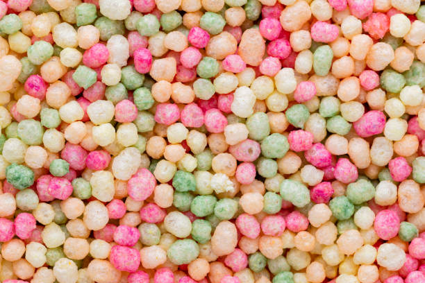 istock Thousands sprinkles tiny sugar beads for decorating cakes and desserts background. 1366196295